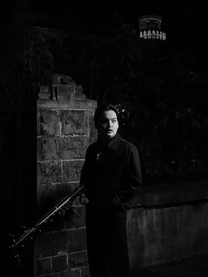 A dramatic black and white portrait from the same series.