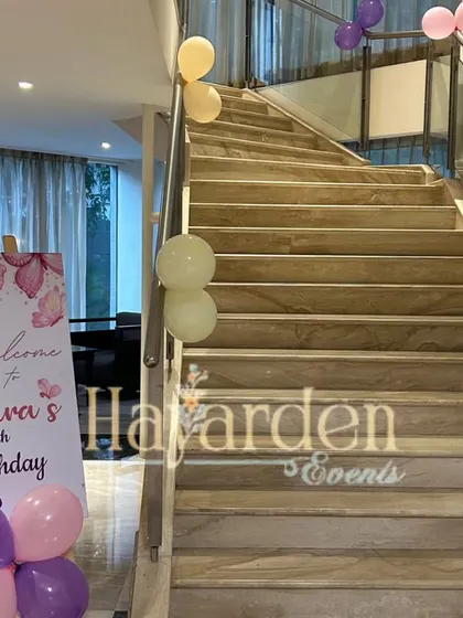 A custom welcome sign for a butterfly-themed 5th birthday, setting the magical tone right from the entrance.