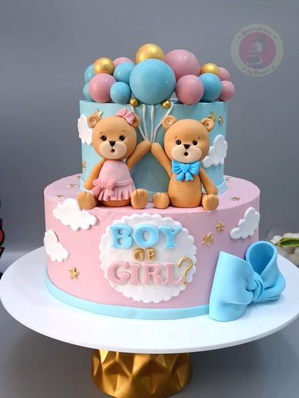 The full view of the two-tier teddy bear baby shower cake, a perfect centerpiece for a gender reveal party.