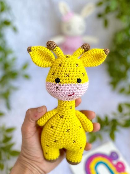 A classic duo, the giraffe and the bunny! This bunny is personalized with the name "Nitaya" on her pink dress. These make a wonderful gift set for a new baby.
