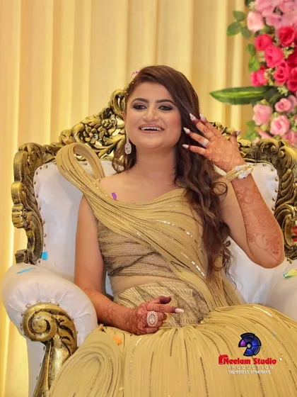 A candid moment from Suman's engagement. She looks absolutely radiant and happy, with a glamorous makeup look that is perfect for the celebration.