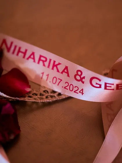 A personalized ribbon with the couple's names and wedding date. It's a tiny detail, but it's these small touches that tie the entire event together with a sense of bespoke luxury.