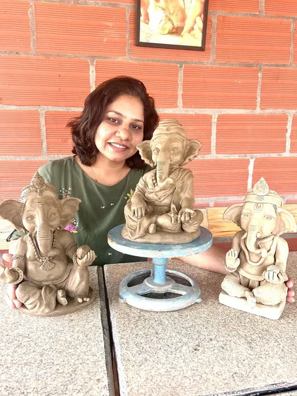 Me with three of my Ganesha creations. Each one is different, and each one is made with so much love.