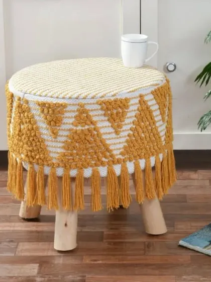 Add a cozy, bohemian vibe to any corner with our handcrafted macrame and jute stools. They are perfect as extra seating, a footrest, or a stylish side table for your coffee mug.