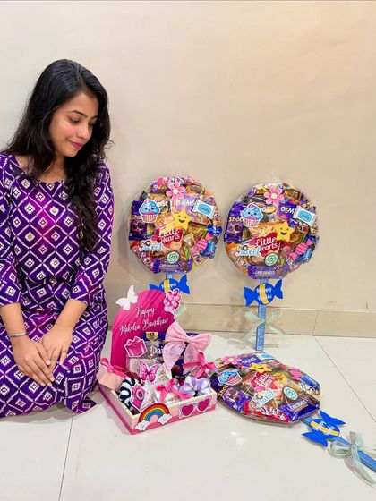 Making hampers for my own family is how I express my love. Here are some lollipop hampers and a gift box I made for my loved ones during Raksha Bandhan.