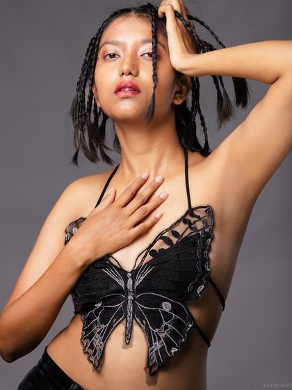 A color version of a portrait with the butterfly top, showing a confident pose.