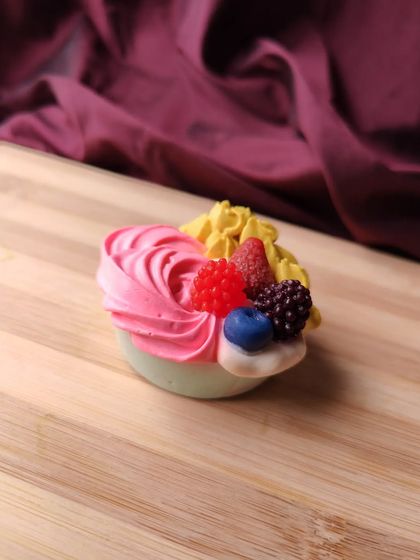 My berry theme cupcake soaps are a treat for your skin and your senses. They are topped with little soap berries and a swirl of frosting.