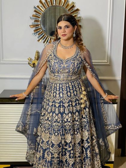 A powerful pose showing off the full outfit. This is a great example of a full-glam look I can create for your special occasion in the Delhi NCR area.