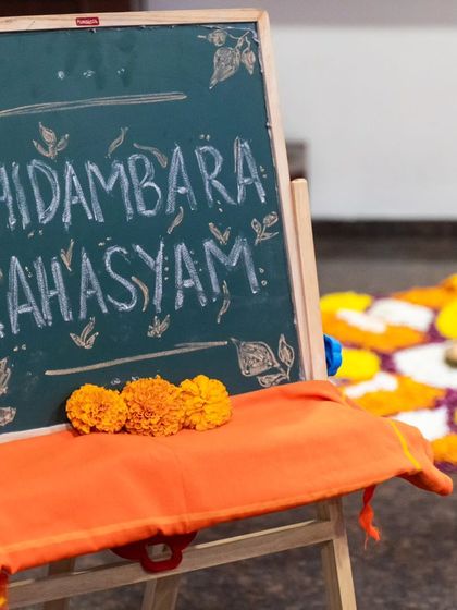 The stage is set for our offering. This simple welcome sign at the entrance captures the essence of the evening, an intimate and heartfelt exploration of the 'Chidambara Rahasyam', the secret of the heart space.