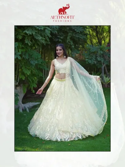 Glow like golden sunlight in this yellow organza lehenga. I designed it to be airy and light, with delicate sequin detailing that catches the light with every move.
