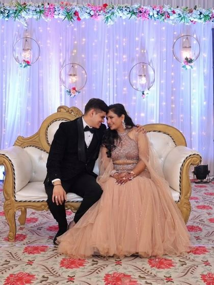 A romantic moment captured in my rental outfits. The peach fish-cut lehenga and black tuxedo create a timeless and elegant pair, perfect for any formal celebration.