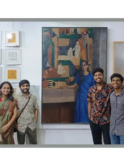 A group of friends and fellow artists at the annual exhibition.