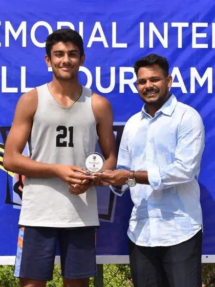 Presenting an individual award at the inter school tournament. It's great to see young talent being recognized.