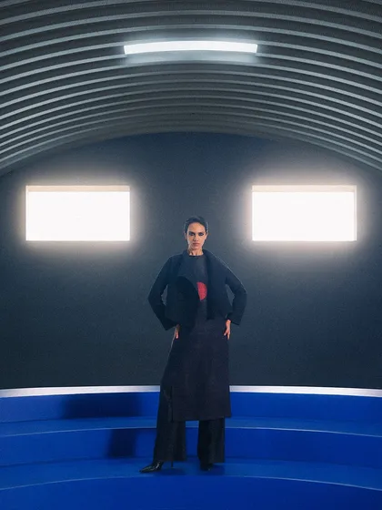 A powerful wide shot from another Payal Khandwala campaign. The stark, symmetrical architecture and bold blue floor create a futuristic setting for the minimalist ensemble.