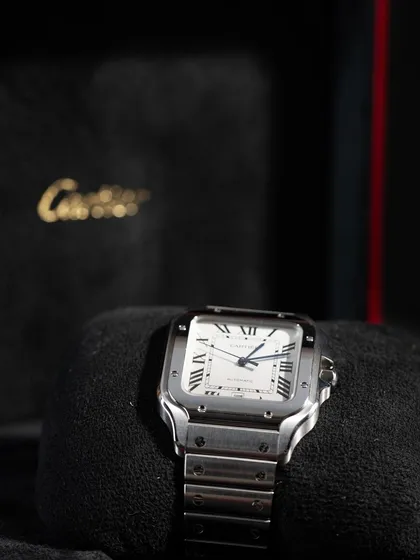 The Cartier Santos, presented as it should be. We specialize in sourcing full set luxury watches, meaning you get the original box and papers, guaranteeing authenticity and value for your collection.