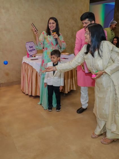 Here's our "Diaper Pong" game in action! We love seeing guests of all ages get a little competitive and share a laugh. It’s a perfect icebreaker for any baby shower.