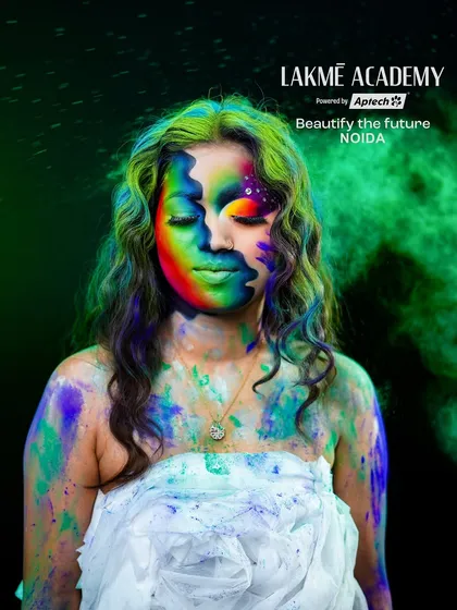 A full-body shot of the Holi-themed look. The colors splashed on the body and the creative outfit complete this artistic and celebratory concept.