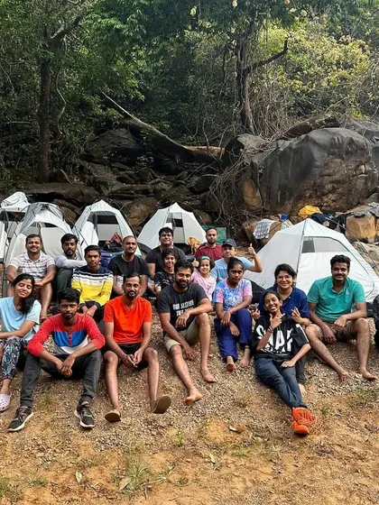 The group sitting in front of their tents, enjoying the evening at our beautiful campsite.