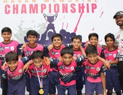 Our coaches with one of our teams at the Hasan Memorial Championship. They lead by example with passion and dedication.