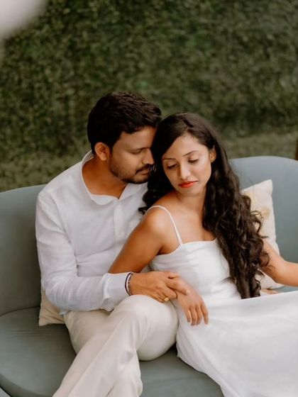 A quiet and intimate portrait of a couple on a sofa. This showcases my ability to capture serene and thoughtful moments during a pre-wedding session.