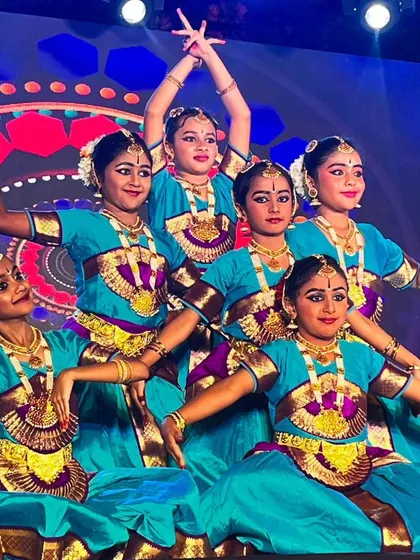 Look at the focus and poise of my young Bharatanatyam dancers. We build a strong foundation in classical dance, preparing students for stage performances and cultural events like this Onam celebration.