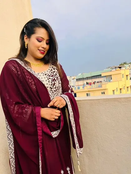 A full-length shot showing how the makeup and outfit work together for a complete, elegant look.