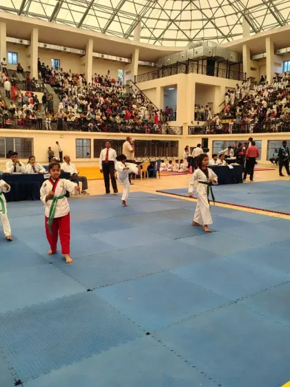Our young athletes in the middle of their Poomsae performance at a state-level championship.