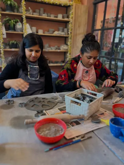 The quiet focus of hand-building. This meditative process allows you to get lost in the details and create something truly unique.