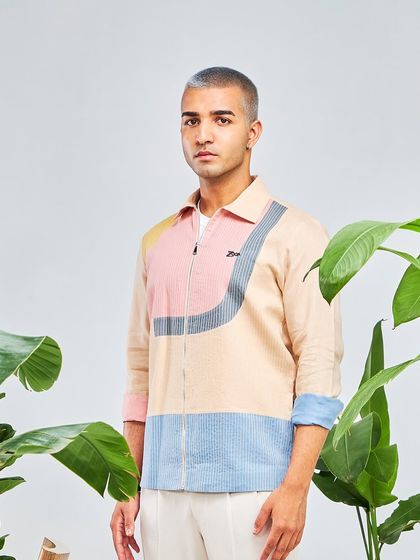 Another look at the sorbet-hued color-blocked jacket from the Antriksh collection. It's a unique piece that is sure to make you stand out.