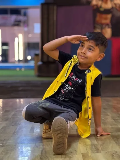 Confidence in the making. This young dancer strikes a pose during our hip-hop class, showing off the attitude and style we help nurture. Our classes are a space for kids to express themselves.