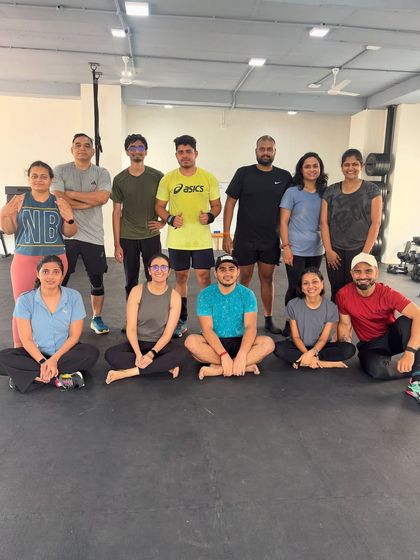 A happy group shot after a tough session. The smiles and sense of accomplishment are what make our community special.