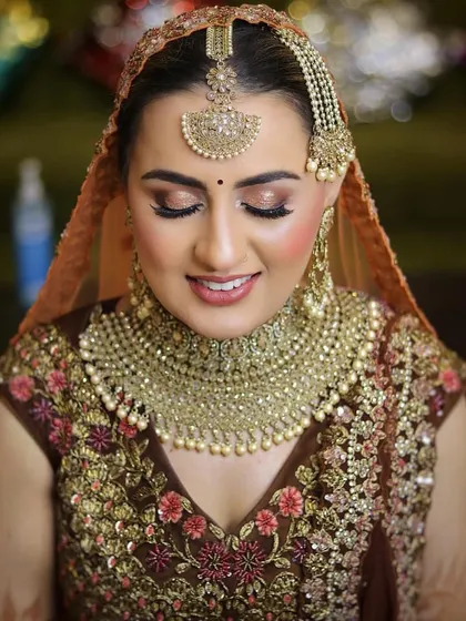 A closer look at my bridal artistry. I specialize in creating a luminous skin finish with soft glitter on the eyes, enhancing the bride's natural beauty without feeling heavy.