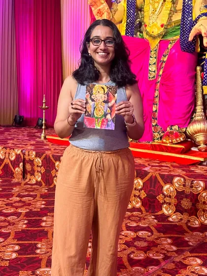 Me holding my finished sketch in front of the grand Ganpati idol in Borivali. It’s a wonderful feeling to create art in the presence of such grandeur and share it with the community.