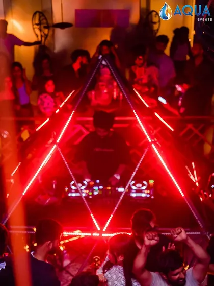 A view from behind the unique pyramid lighting rig at The Fixx Bar, showing me at the center of the action.
