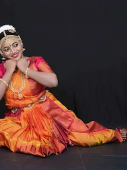 Presenting Aruna in her Rangapravesha. This seated pose, with its gentle expression, shows a different facet of the dance, one of quiet contemplation and storytelling.