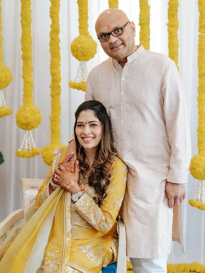 A precious moment captured during the Godh Bharai ceremony. The makeup is timeless and elegant, designed to make her feel beautiful and comfortable on this memorable day.