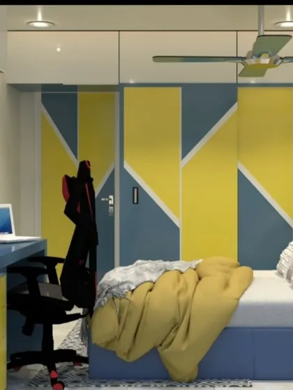 This angle shows the wardrobe with its bold geometric pattern and the integrated study desk.
