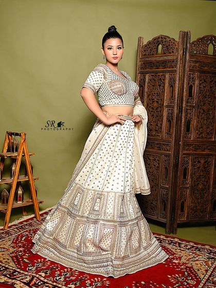Another full-length pose, showcasing the beautiful flare of the lehenga.