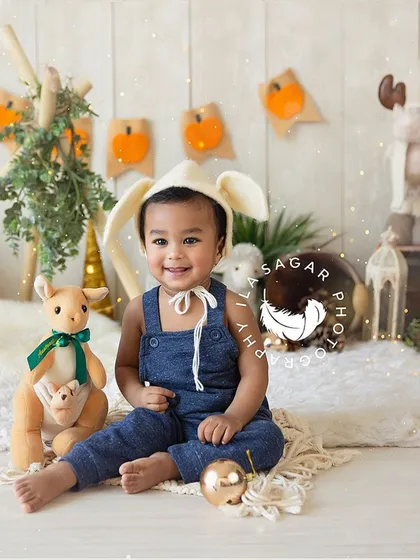My props are also great for toddler and child portraits. This woodland-themed setup includes a felt bunny hat, a small teepee frame, and other rustic accessories for a playful photo session.