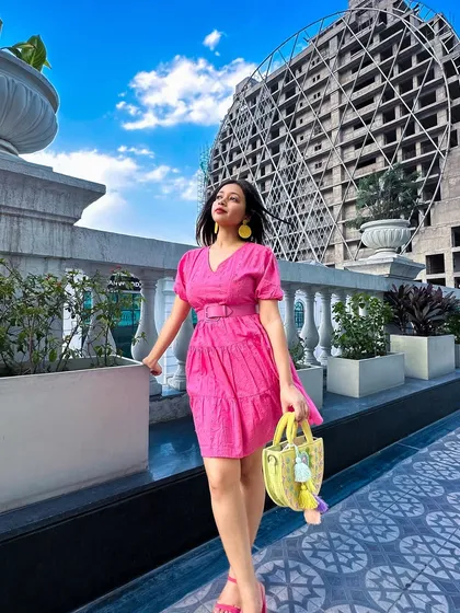 Looking up at the sky, feeling the summer breeze. This pink dress is all about happy, confident energy.