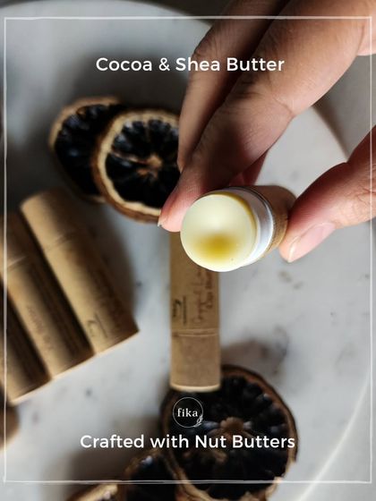 My lip butters are crafted with nourishing nut butters like Cocoa and Shea Butter. This close-up shows the smooth, rich texture that glides onto your lips to heal and protect.