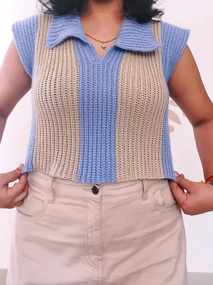 This is my Knit-Like Sweater Vest, which uses a special crochet technique to mimic the look of knitting. The polo collar and two-tone design give it a classic, preppy feel.