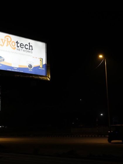 Our billboard standing tall at night, a beacon of connectivity for the modern Indian.