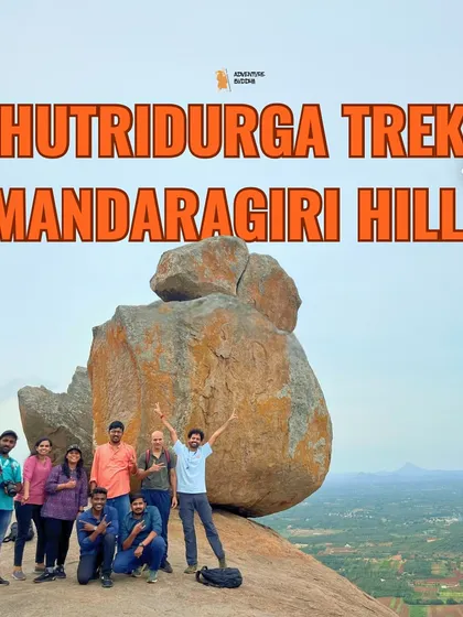 A graphic for our Huthridurga and Mandaragiri trek, featuring a group on the rocky summit.