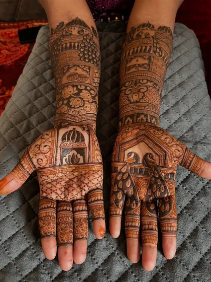 The full view of the peacock-themed bridal mehendi, a true masterpiece of henna art. This design is perfect for a bride who loves traditional and elaborate patterns.
