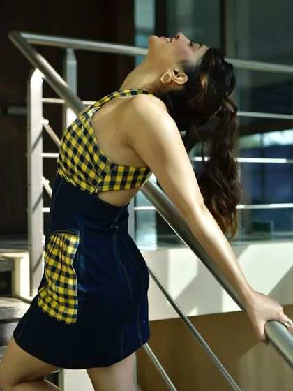 An expressive and dramatic pose that adds an artistic flair to a commercial shoot.