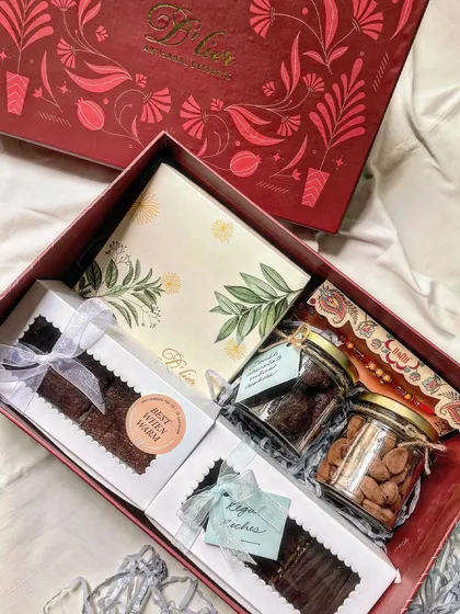 Our Premium Rakhi Hamper, elegantly boxed and filled with a curated selection of our best-selling truffles, brownies, cookies, and almonds.