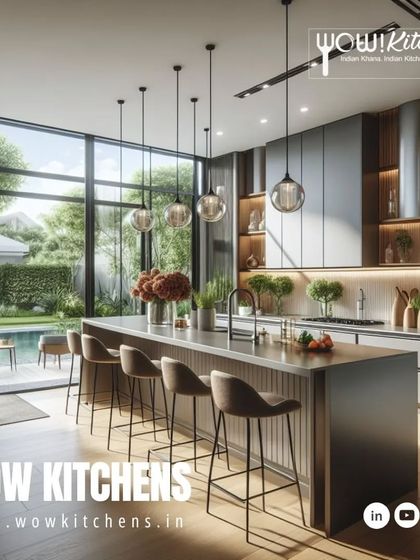 An open-air feel defines this luxury kitchen. Floor-to-ceiling windows, a large island with bar seating, and elegant pendant lights create a space that's perfect for both cooking and socializing.