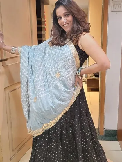 Another pose in my Navratri outfit. The bandhani dupatta and traditional jewelry are essential for the perfect garba night look.
