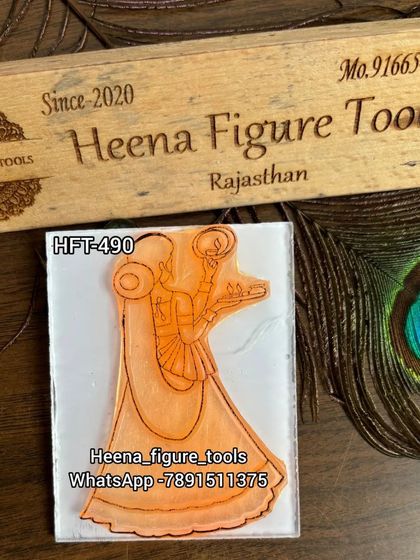 This stamp features a woman holding a 'puja thali' and looking at the moon, capturing the essence of the Karwa Chauth ritual.